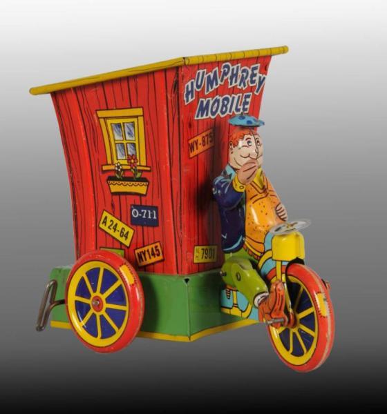 Appraisal: Tin Wyandotte Humphrey Mobile Wind-Up Toy in O B Description