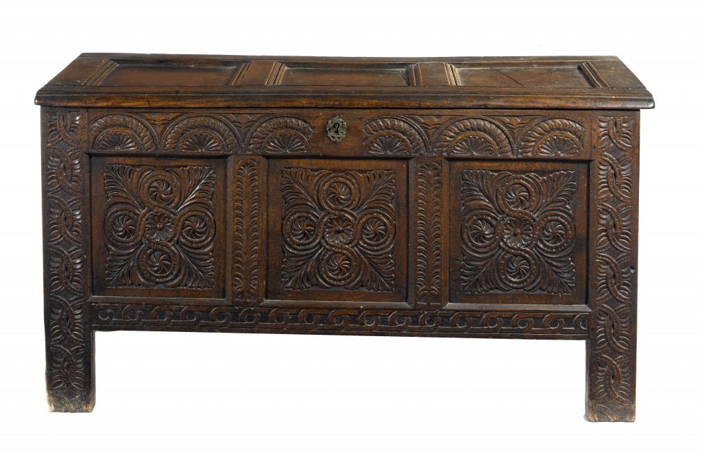 Appraisal: A CHARLES II JOINED OAK CHEST with three-panel lid the