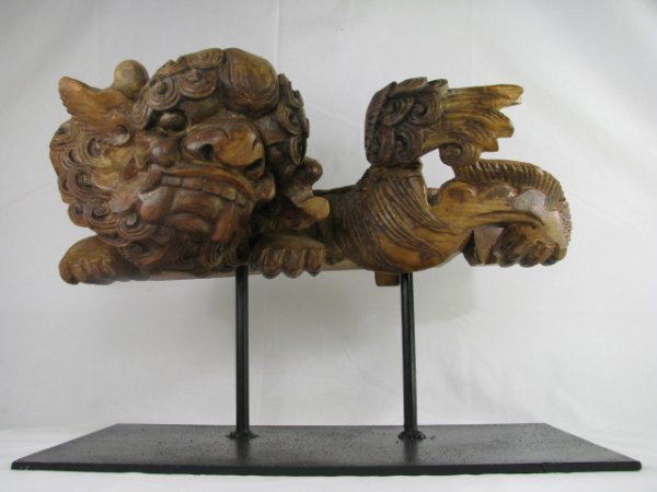 Appraisal: Vintage carved weathered Chinese Foo dog mounted on a black