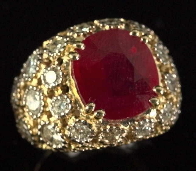 Appraisal: Fourteen-Karat Yellow Gold Ruby and Diamond Dinner Ring featuring a