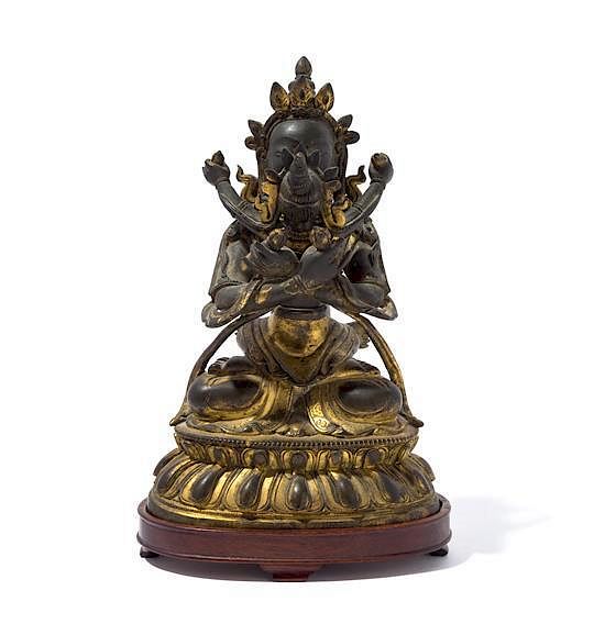 Appraisal: A Sino-Tibetan Gilt Bronze Figure of a Deity in Yab-Yum