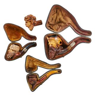 Appraisal: MALE BUST MEERSCHAUM PIPES Four Depicting a scholarly figure a