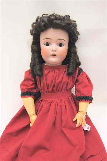 Appraisal: GERMAN BISQUE SOCKET HEAD DOLL attributed to Kestner having black