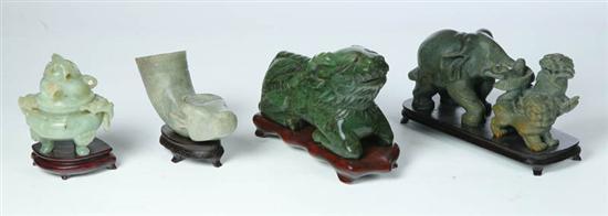 Appraisal: FOUR STONE CARVINGS Asian th century green soapstone Small covered