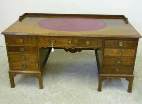 Appraisal: A MAHOGANY PEDESTAL DESK th century the moulded edged top