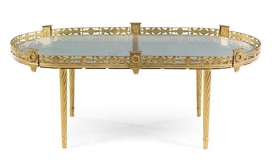 Appraisal: An Empire Style Gilt Metal Low Table Height x width