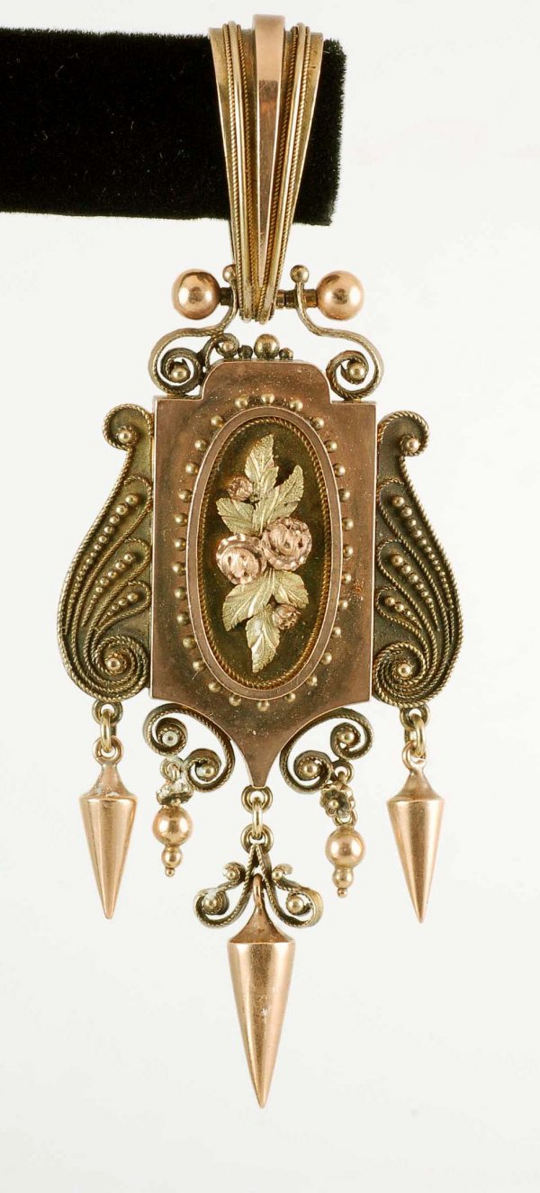 Appraisal: Victorian gold pendant decorated with filigree beads and drops with