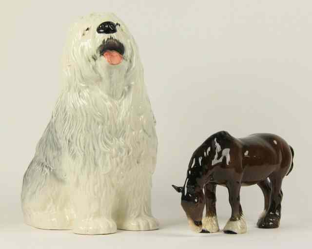 Appraisal: A Beswick 'Fireside' model of an Old English sheepdog cm