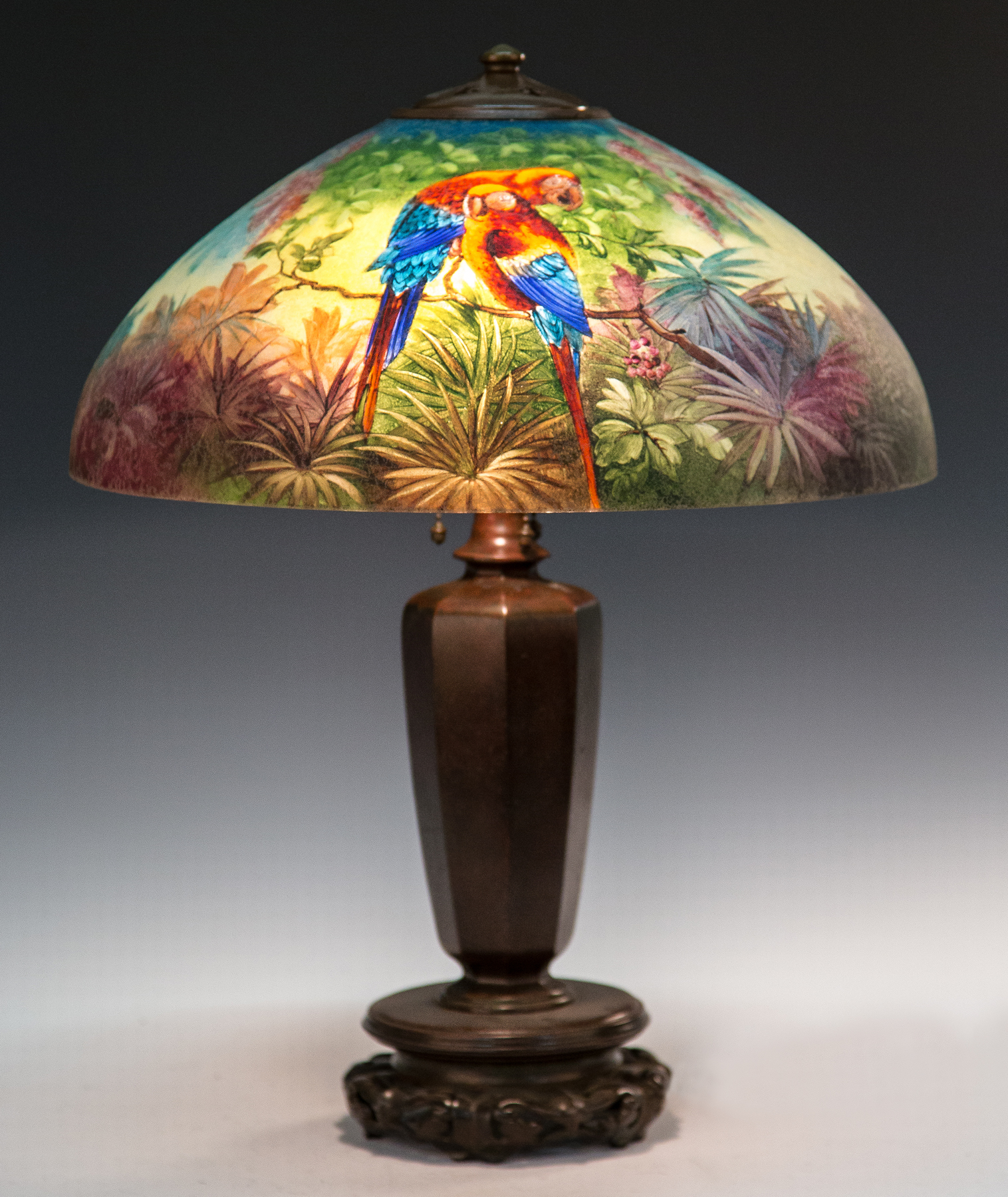 Appraisal: Handel Reverse Painted Parrot Lamp Early th century Chipped ice