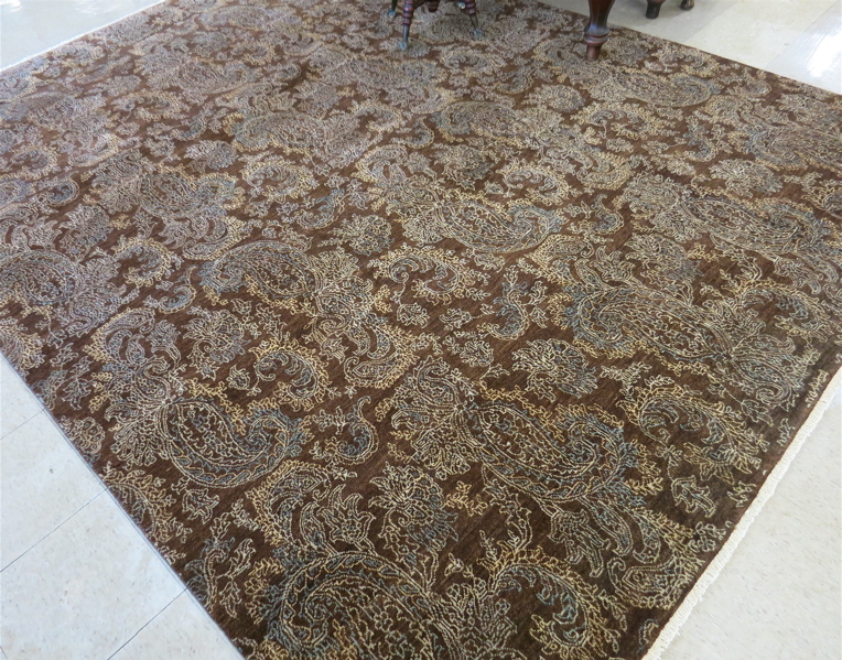 Appraisal: HAND KNOTTED ORIENTAL CARPET featuring an overall non-traditional floral boteh