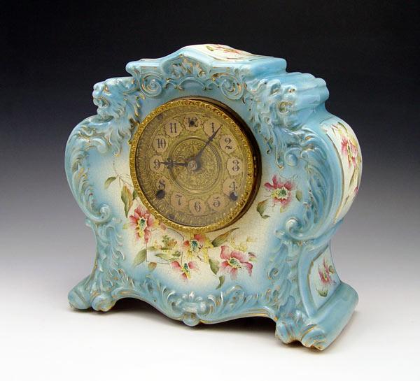 Appraisal: ANSONIA PORCELAIN CASE CLOCK Unique porcelain case with figural lion