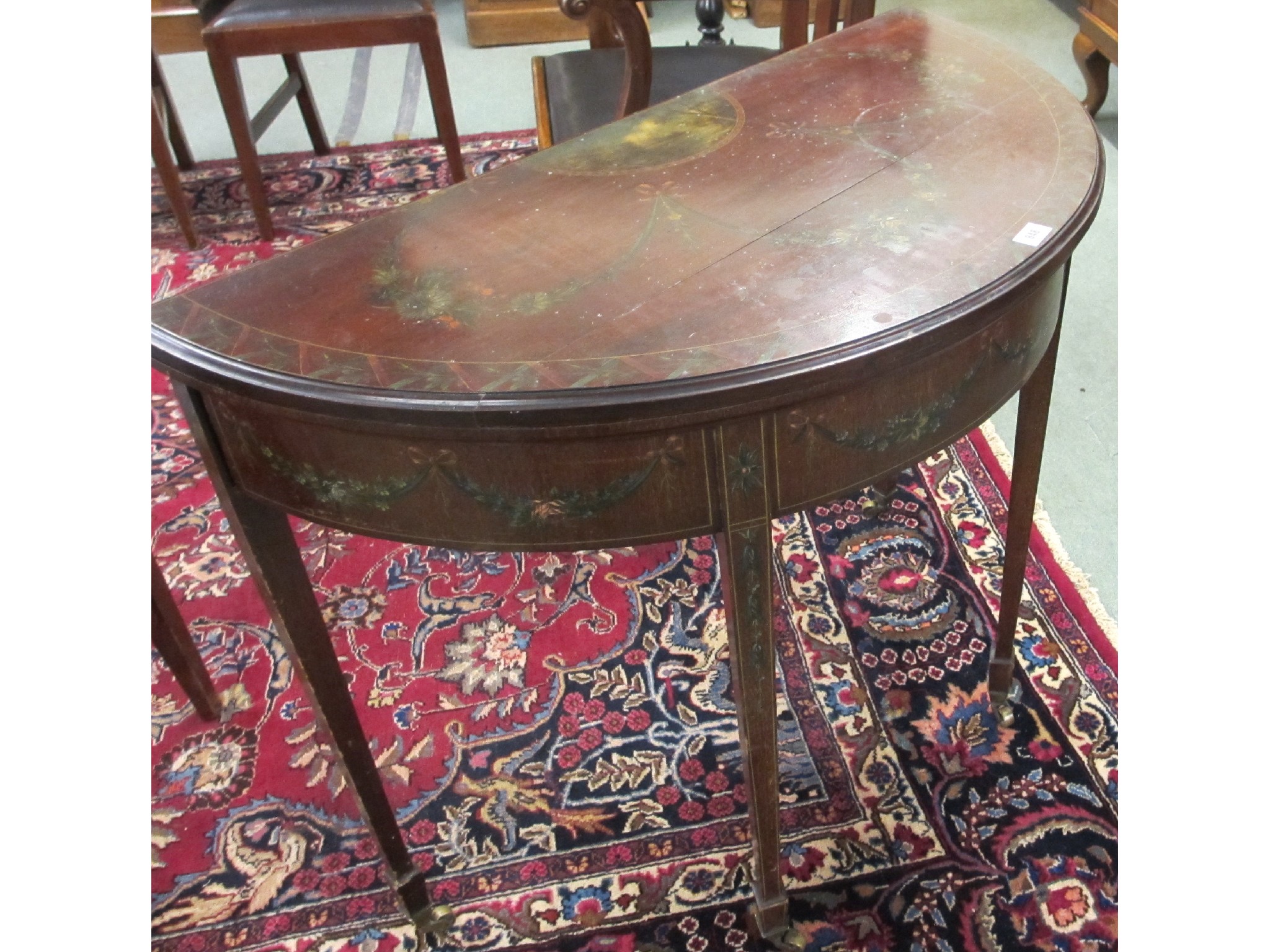 Appraisal: Edwardian mahogany and painted Adam style D shaped card table