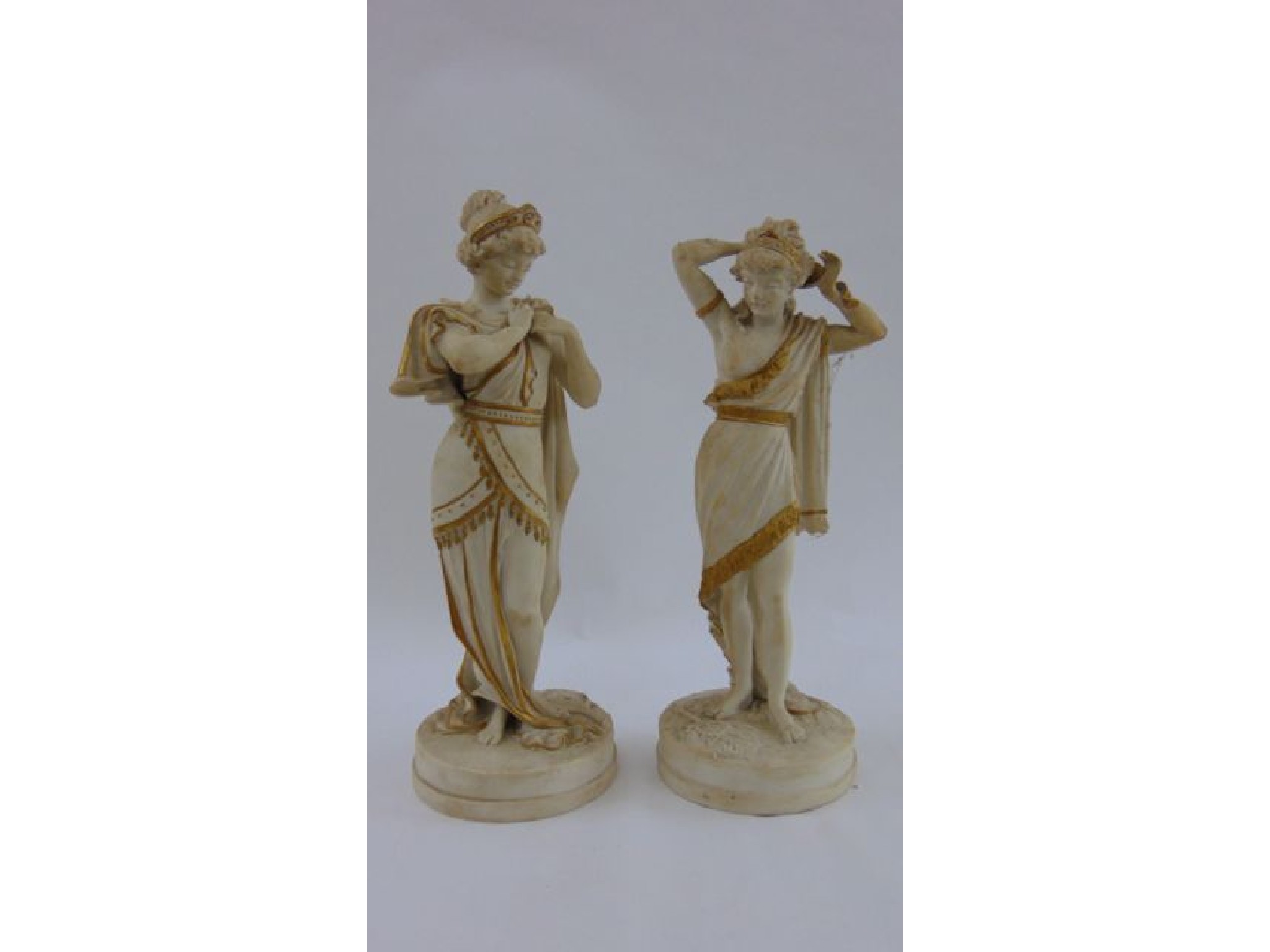 Appraisal: A pair of th century Parian figures classical male and