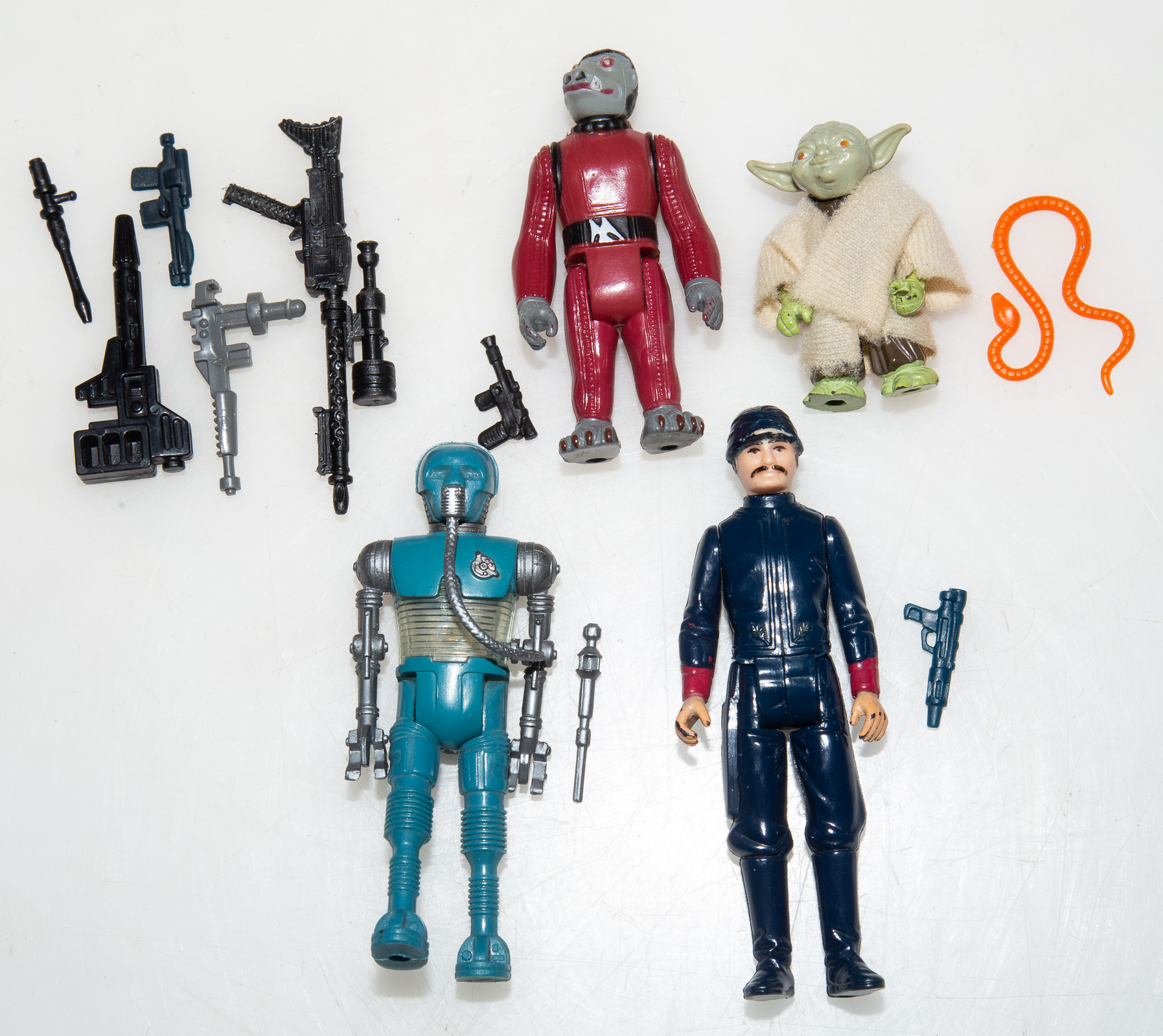 Appraisal: FOUR KENNER STAR WARS FIGURES Includes Snaggletooth Yoda with snake