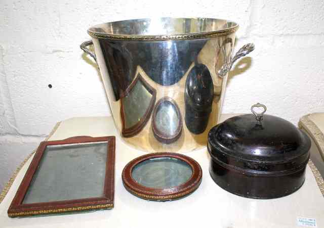 Appraisal: A SILVER PLATED TWO HANDLED WINE COOLER two leather photograph