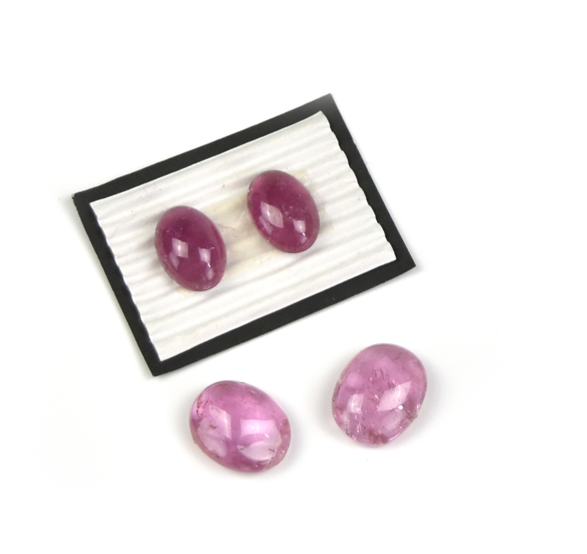 Appraisal: Two Pairs of Tour Oval Cabs Jewel Stones in pink