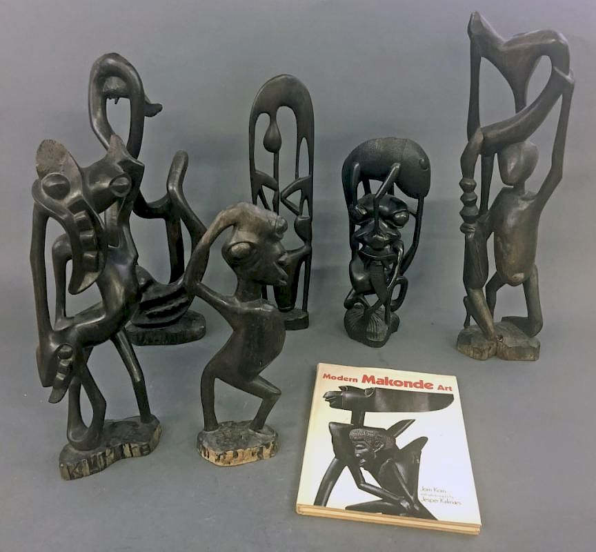 Appraisal: Six Makonde Shetani Carvings and Book Six Makonde shetani spirit