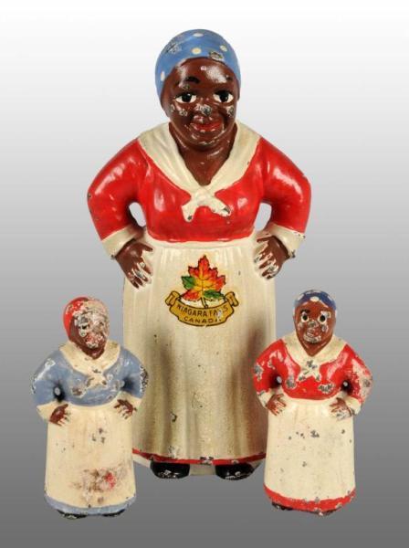 Appraisal: Lot of Cast Iron Mammy Figures Description Includes souvenir still