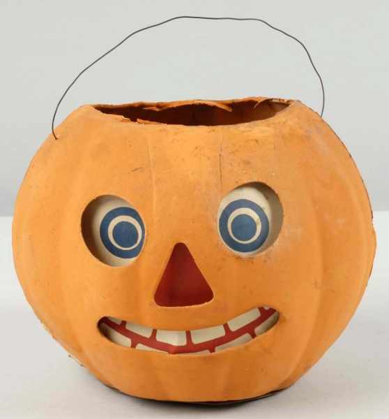 Appraisal: Paper Mache Orange Jack-O-Lantern Description German Original paper label eyes