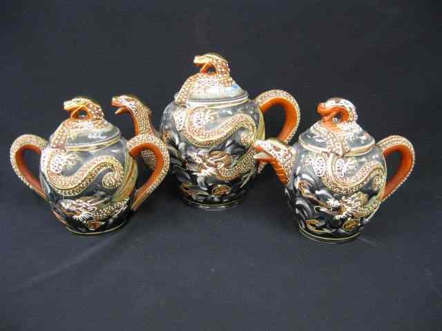 Appraisal: Oriental Porcelain Dragonware Tea Set raised dragon moriage decor teapot