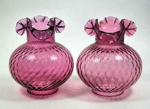 Appraisal: A pair of Victorian cranberry glass bulbous oil lamp shades