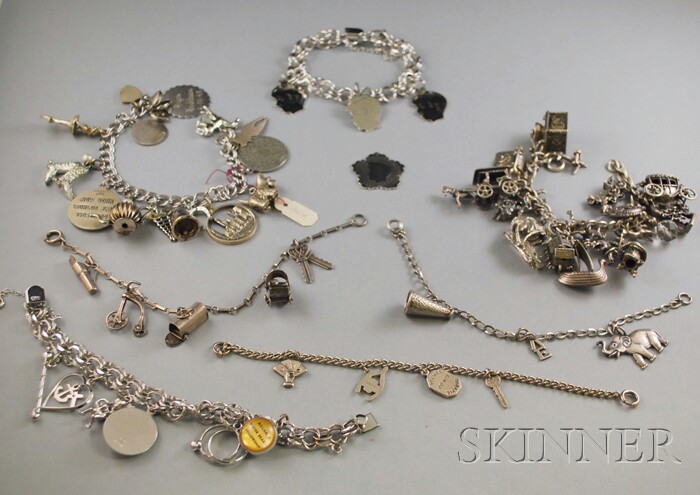 Appraisal: Six Sterling Silver Charm Bracelets with a variety of charms