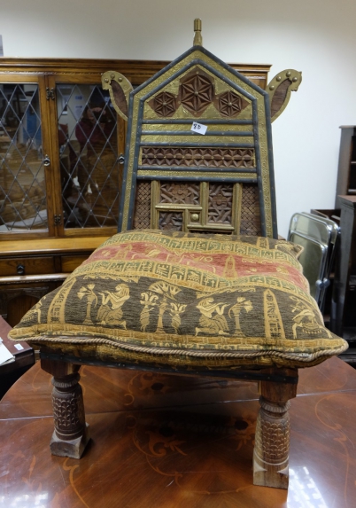 Appraisal: Reproduction brass and carved wood oriental style decorative chair