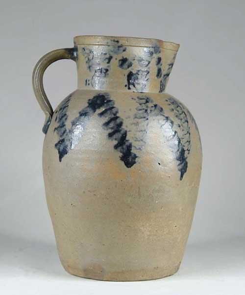 Appraisal: OVERSIZE STONEWARE BLUE DECORATED PITCHER Zigzag blue decoration on shoulder