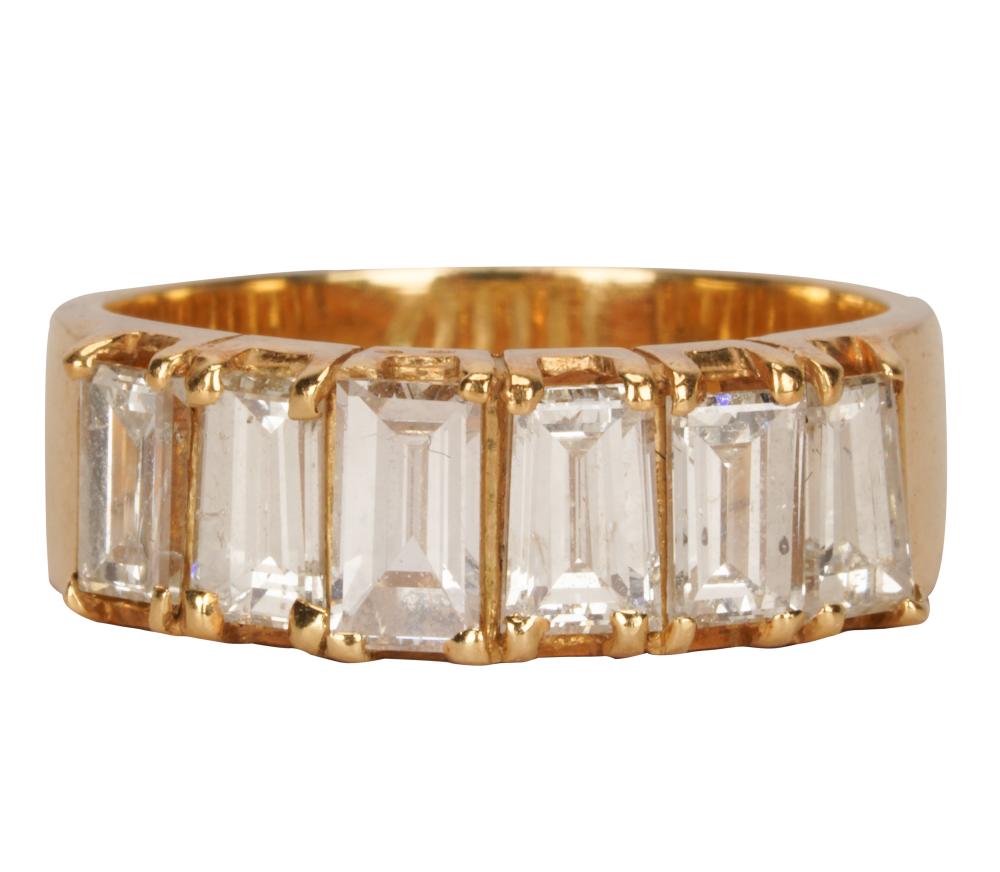 Appraisal: KARAT YELLOW GOLD DIAMOND BAND RINGcontaining six baguette-cut diamonds K-L