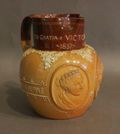 Appraisal: A Doulton Lambeth salt glazed stoneware commemorative jug of Queen