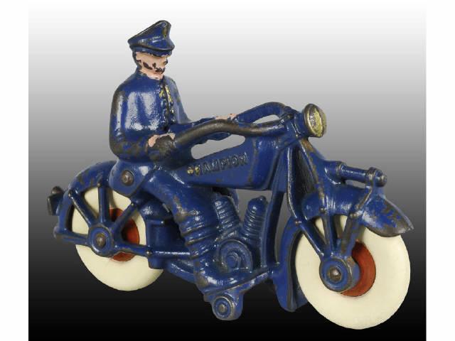 Appraisal: Cast Iron Blue Champion Police Motorcycle Toy Description Motorcycle has