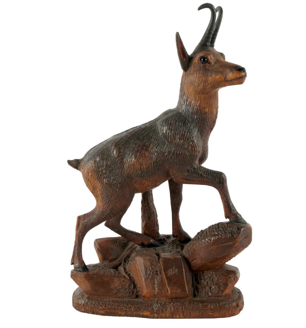 Appraisal: BLACK FOREST CARVED WALNUT GOAT FIGUREunsigned inches wide inches deep