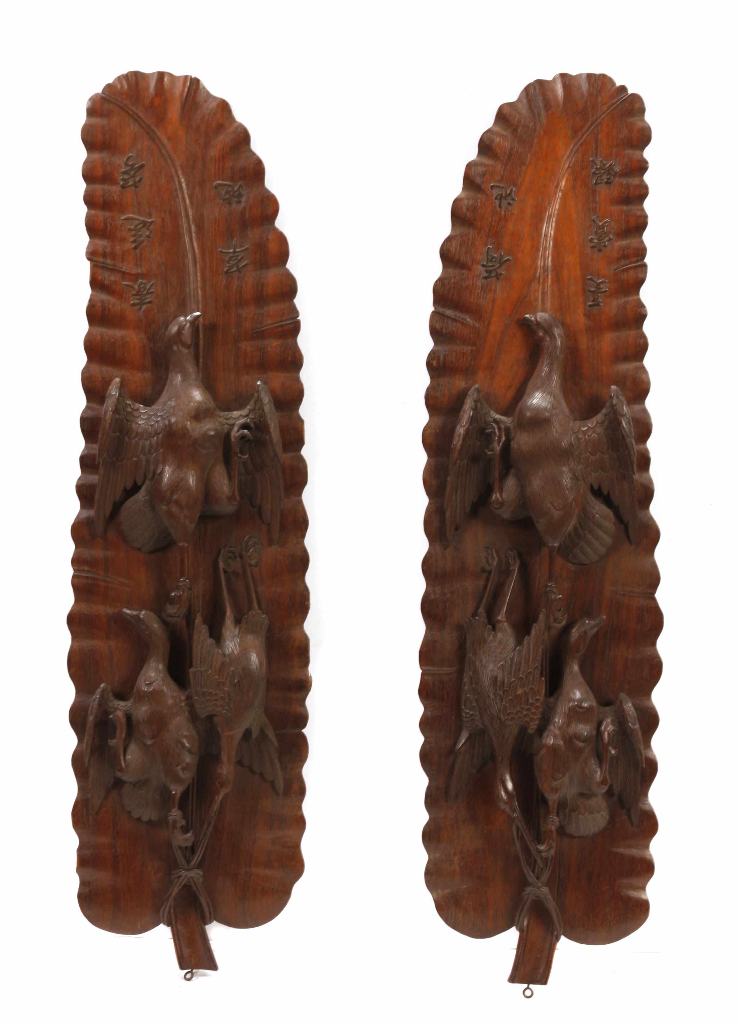 Appraisal: Property of Various Owners A pair of carved hardwood trophies