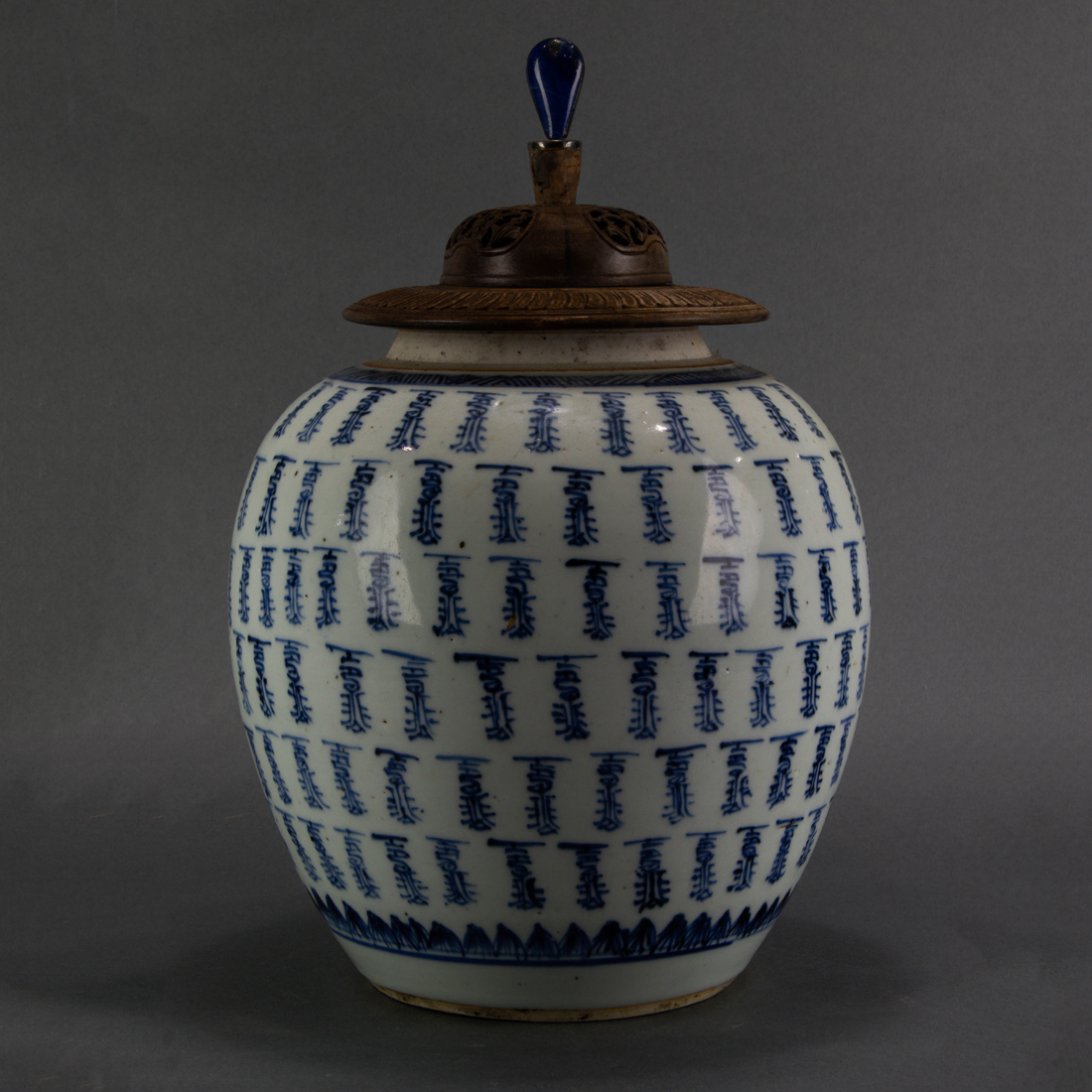 Appraisal: UNDERGLAZE BLUE JAR Underglaze blue jar with later wood lid