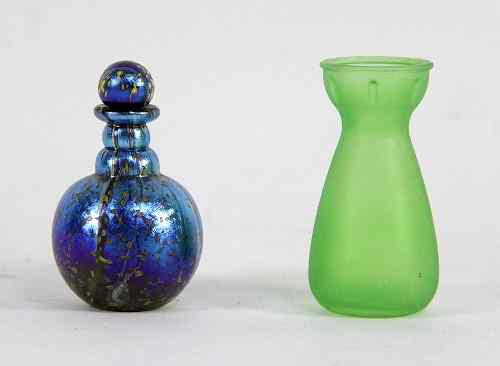 Appraisal: A Loetz type iridescent glass scent bottle and a green