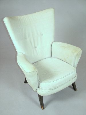 Appraisal: An Ernest Race pale cream upholstered lounge chair 's upon