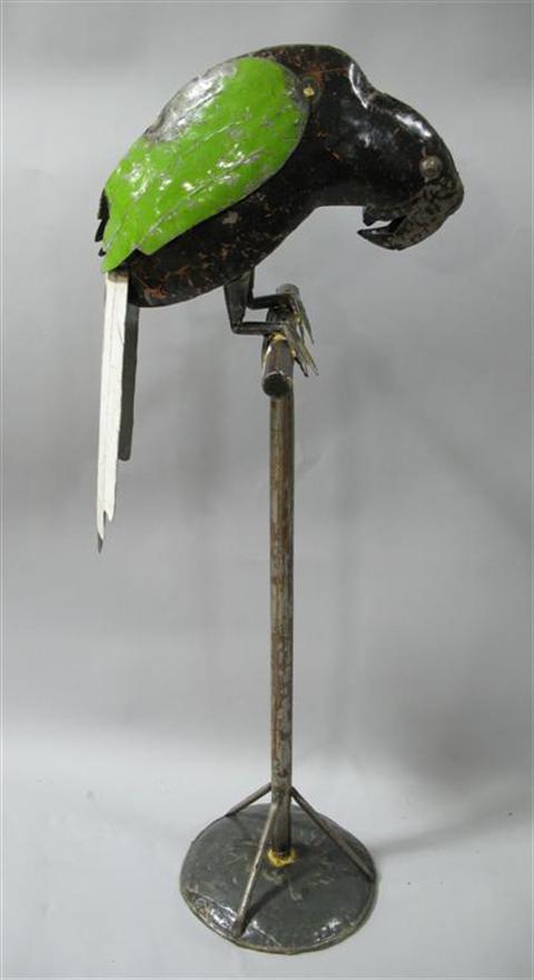 Appraisal: WHIMSICAL SHEET METAL PARROT ON A PERCH The bird made