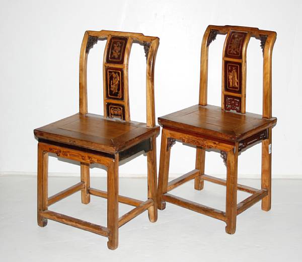 Appraisal: A pair of Chinese softwood side chairs Each with rectangular