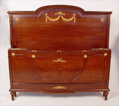 Appraisal: FRENCH EMPIRE STYLE ORMOLU BED Oak with applied ormolu decoration