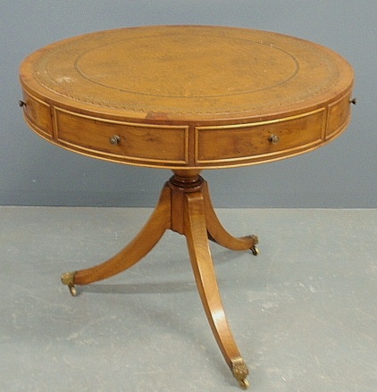 Appraisal: - English yew wood rent table with round tooled leather