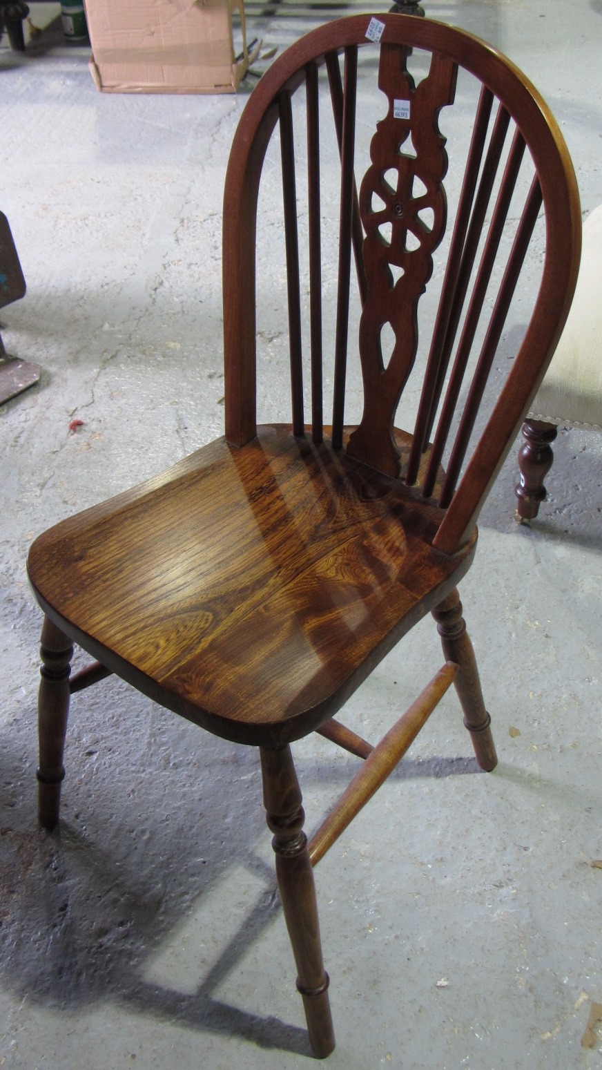 Appraisal: A set of five ash and elm wheel back chairs