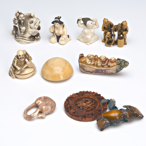 Appraisal: NETSUKE AND CARVINGS Ten ivory and bone netsuke carvings th