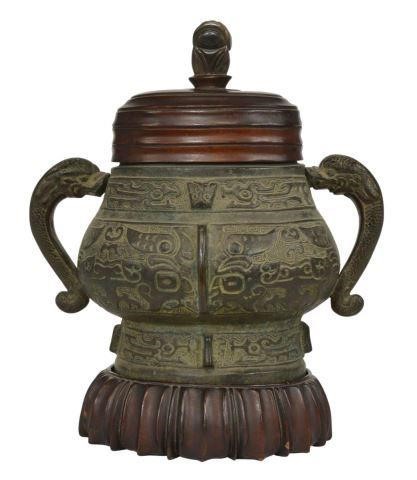 Appraisal: Chinese Archaic style patinated bronze ritual food vessel gui wooden