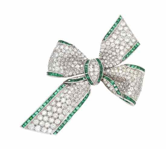 Appraisal: A Platinum Diamond and Emerald Bow Brooch Tiffany Circa consisting