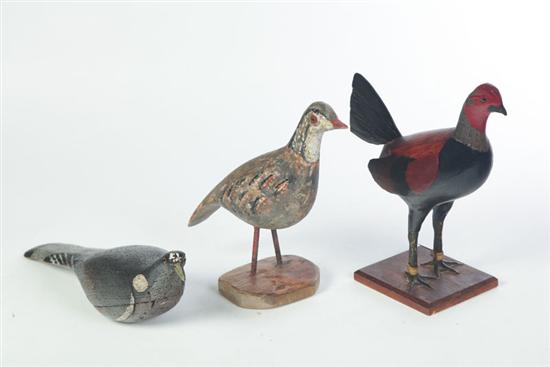 Appraisal: THREE CARVED WOODEN BIRDS Second quarter- th century Folksy fighting