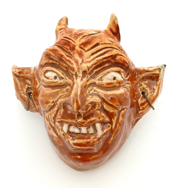 Appraisal: MARGUERITE MAHOOD Victoria circa Earthenware goblin mask head modelled with