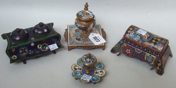 Appraisal: Two brass champleve enamel decorated inkwells early th century and