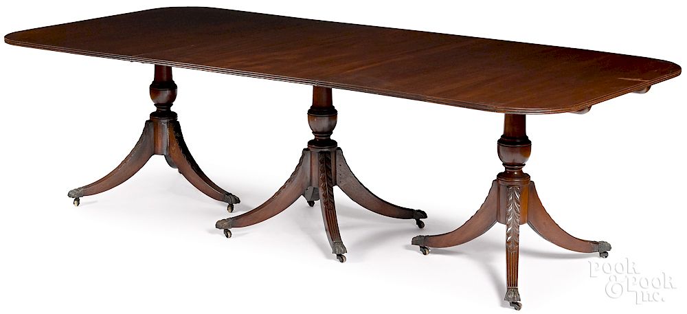 Appraisal: Federal style mahogany triple pedestal dining table Exclusive on Bidsquare