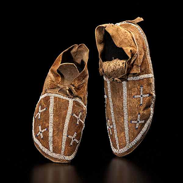 Appraisal: Arapaho Beaded Hide Moccasins sinew-sewn and beaded using beads of