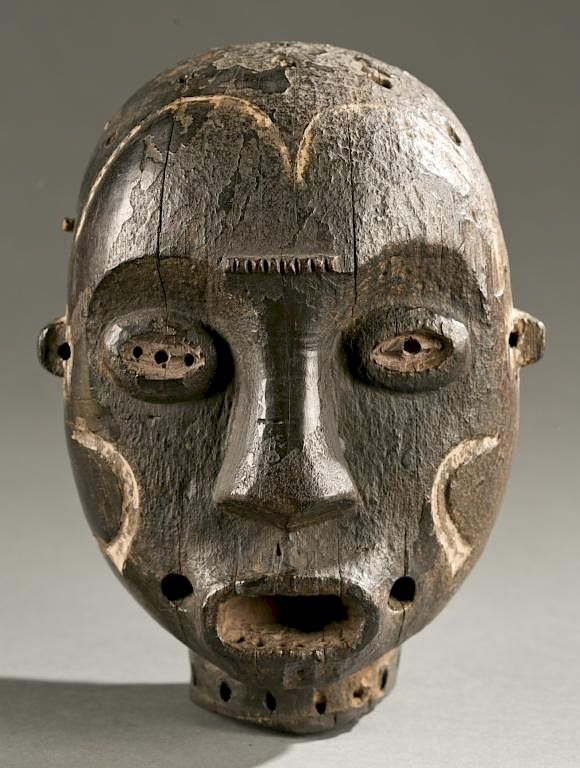 Appraisal: Idoma wooden head dance crest A wooden head for dance